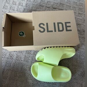 Women’s lime green Yeezy slides size: US 6